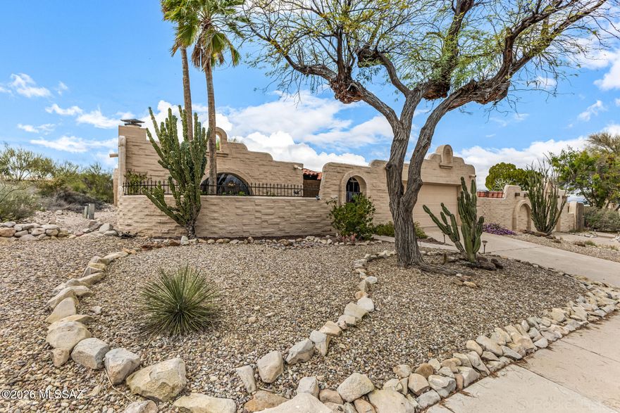 Beautiful Southwestern-style home featuring classic adobe architecture, charming courtyard entry, and low-maintenance desert landscaping. Inside, the spacious open floor plan offers abundant natural light, large living areas, and distinctive architectural features including a stunning beehive fireplace and arched windows.

The kitchen is centrally located and includes extensive cabinetry, tile countertops, breakfast bar seating, and a skylight that fills the space with natural light. The kitchen opens seamlessly to the main living areas, making it ideal for entertaining.

Generous living spaces feature tile flooring throughout, large sliding doors to the covered patio, and views of the private backyard. The outdoor space includes a covered patio, mature desert landscaping, and plenty of room to relax or entertain.

The home also offers spacious bedrooms, a walk-in closet, and comfortable bathrooms with tile surrounds.

Conveniently located near shopping, dining, and outdoor recreation, this property blends classic Southwestern charm with comfortable living.