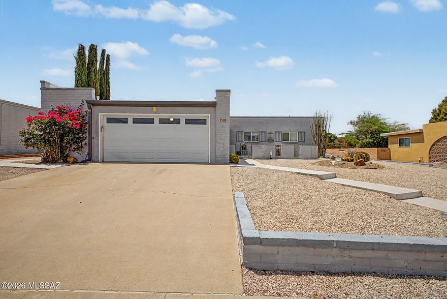 Remodeled, slump block gem! This adorable single-story home welcomes you with a manicured landscape and a 2-car garage. Interior showcases a spacious layout with new tile flooring, contemporary lighting, newer windows, a neutral palette, & plenty of natural light. The remodeled kitchen is complete w/ ample cabinetry adorned w/ crown molding, elegant quartz countertops, backsplash, gas cooking & stainless steel appliances. The main suite is spacious & offers, tile floors, a private remodeled bathrm & walk-in closet. Out back, you'll have plenty of space for entertaining, relaxation, & storage, w/ a covered patio ideal for casual dining, ample seating space w/ pavers, artificial turf, & a storage shed. Decorative fireplace stays. Newer hot water heater. All appliances in kitchen stay. Low HO Washer and dryer stay too.  Plantation shutters, fans in bedrooms, remodeled bathrooms, fans in bedrooms.  Great solar lease plan with low utility bills.  The entire home shows like new and in excellent condition.  Move-in ready! Low HOA fees per month! Walking distance to GVR pool, Desert Meadows Park, and De Anza Trail.