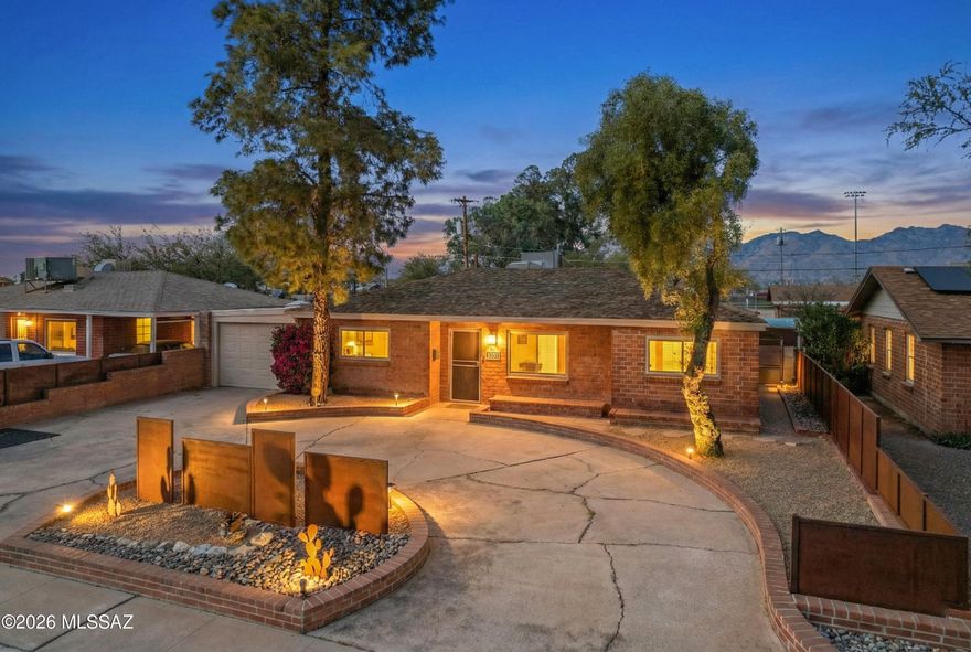 So much to love about this charming central brick 3bd/2ba home. Carefully maintained & upgraded-everything has been done for you! Custom metal work brings great curb appeal. 1 car garage, 2 storage sheds, metal fencing, built-in kitchen under patio cover, gas firepit w/built-in seating & shaded courtyard set this home apart from the rest. Open kitchen boasts breakfast bar, SS appliances w/refrigerator, granite counters, upgraded sink & fixtures. Den/Easy 4th bedroom with double french doors. Luxury vinyl tile throughout in beautiful light wood color, tastefully remodeled bathrooms-walk-in showers, deep cast iron tub, granite & porcelain counters. Spacious primary suite has large walk-in closet. Laundry room w/front loading WR/DR. Double & triple paned windows & sliding door. NEW ROOF 12/'2