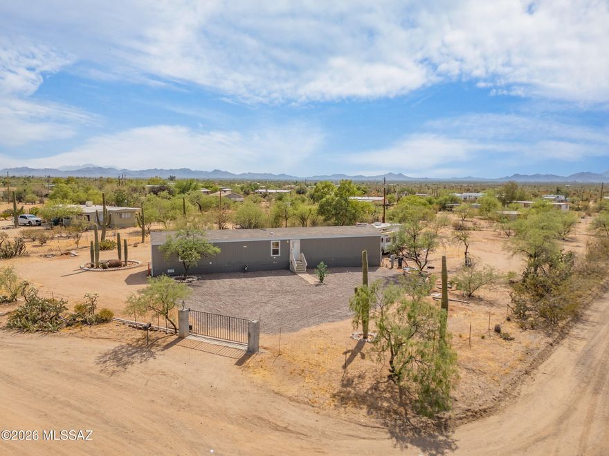 Be the very first to call this home yours. Nestled on a spacious 1 acre lot in scenic Picture Rocks, this brand-new 2025 Cavco manufactured home offers a rare opportunity to own a home that has never been lived in. Surrounded by beautiful natural desert landscape and framed by stunning mountain views, this property delivers the perfect blend of privacy, space, and peaceful Arizona living. A brand-new septic system adds immediate value and peace of mind, making this home truly move-in ready. Enjoy wide open skies, room to roam, and the beauty of the Sonoran Desert--all from your own acre of land.