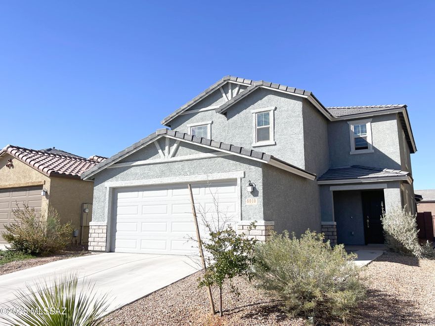 No Application Fees! Larger 4 bedroom, 3 bathroom Tucson home located in the gated community of Casa Amigos offering a spacious layout with modern upgrades throughout. This newer home features tile flooring throughout the first floor with no carpeting, neutral paint throughout, upgraded LED lighting, 2-inch faux wood window blinds, and ceiling fans in each room. The large open living room and dining area flow into the beautifully updated kitchen featuring quartz countertops, tile backsplash, extended countertop with breakfast bar, separate pantry, upgraded cabinetry, gas range, and stainless steel appliances. One bedroom and full bathroom are conveniently located on the first floor. The second floor includes a large loft and three additional bedrooms including the oversized primary suite with extended walk-in closet, double sink vanity, separate linen closet, and extended step in shower. The backyard offers easy to maintain desert landscaping with an extended covered patio, large synthetic grass area, and elevated lot positioning providing sweeping mountain views.

Casa Amigos is a gated neighborhood within the Rocking K Ranch area of Southeast Tucson, offering scenic desert surroundings, nearby parks, and access to outdoor recreation. The location near Old Spanish Trail provides convenient connectivity to shopping, dining, schools, and Davis Monthan Air Force Base while maintaining a quiet residential setting with beautiful mountain views.

All Denali Real Estate residents are automatically enrolled in the Resident Benefits Package (RBP) for $55.00/month which includes Renter's Liability Insurance, Credit Building to help boost the resident's credit scores with timely rent payments, up to $1M Identity Theft Protection, HVAC air filter delivery (for applicable properties), our best-in-class resident rewards program, and much more!