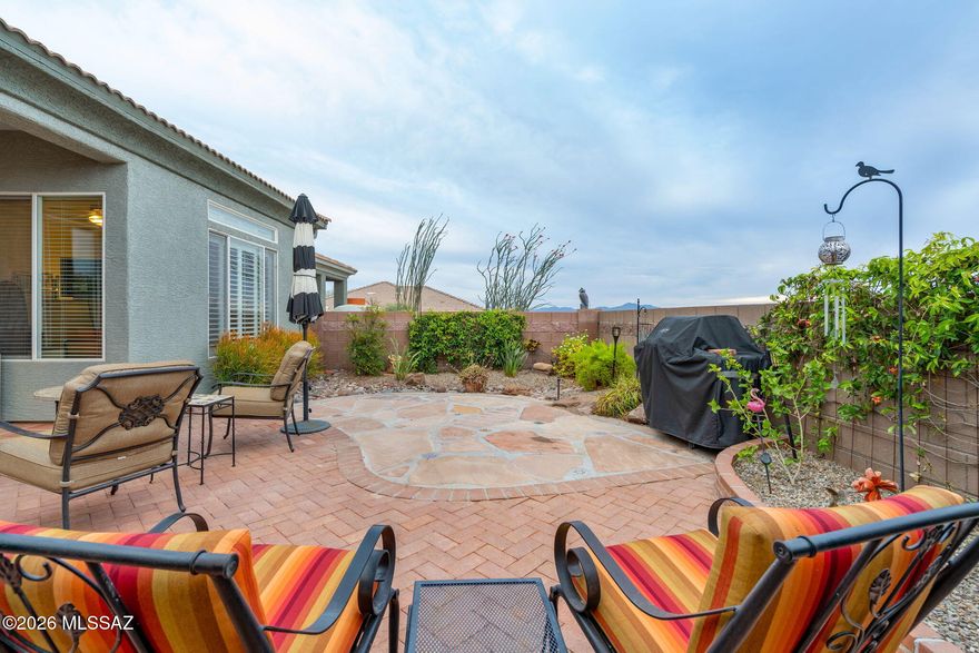 This light and Airy Durango model is priced over $75k LESS than the most recent Durango closing! Gated front courtyard with covered porch, light-filled interior, open-concept kitchen, dining and living areas. Spacious Owner's Suite with sunset views, plantation shutters, and an ensuite with a dual vanity and custom walk-in shower. The split floorplan with the second bedroom and bathroom makes a perfect guest wing or a home office. Laundry room is HUGE and two car garage has plenty of storage. Relax in your private, fully fenced backyard, featuring a covered patio, extensive hardscaping, and low-maintenance plantings. With the recently painted exterior and a newer AC (2020), this GEM is truly move-in ready. Live the resort lifestyle- golf, fitness, dining, and a vibrant social calendar! --> Be as involved as you want to be. Easy access to hiking, shopping, dining, entertainment and I-10.