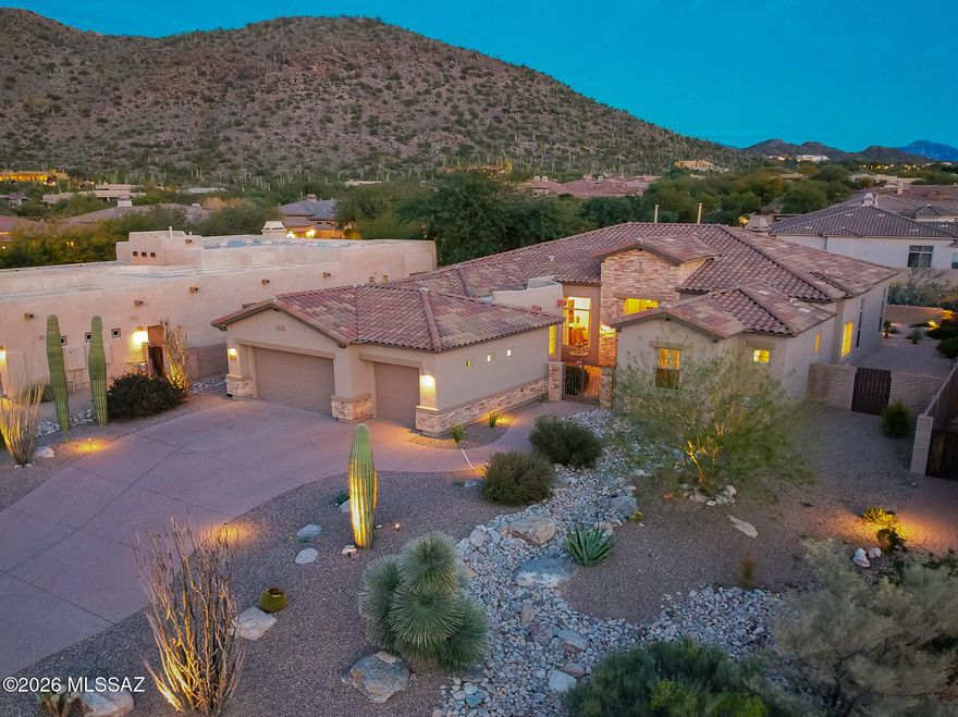 Enjoy a true lock & leave home. Impeccably-cared for custom home by Toll Brothers in the gated Gallery golf community. Biking, golfing, hiking & Sports Center all within walking/biking distance from this location. Enjoy the mountain views from your professionally landscaped backyard retreat, complete with low care desert plantings, gas FP & custom pavers extending the seating areas for entertaining.  This single level floor plan offers flexible living options - 3 bedrooms with ensuite bathrooms & separate den/office area. Viking double oven, 6-burner gas range, microwave drawer, dishwasher. Custom closets & tilework.  Beautiful travertine flooring & stacked rock gas fireplace in great room offers both a casual & elegant setting. See additional details on attached documents.