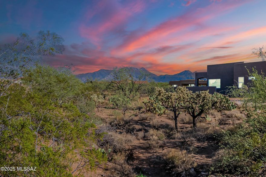 Brand-new luxury construction in the peaceful, prestigious gated enclave of Stone House—this 4-bedroom, 3-bathroom family home is the clean slate you've been waiting for. From the moment you arrive, the craftsmanship is undeniable: a paver driveway and walkway lead you to stunning custom glass-panel French doors, opening to panoramic mountain views that stretch across the horizon.

Inside, high-end finishes create a sense of modern elegance. The gourmet kitchen showcases a quartz waterfall-edge island with breakfast bar seating, a stylish beverage station, designer pendant lighting that complements the dining chandelier, two-tone cabinetry, striking tiled backsplash, and a custom range hood. A spacious pantry keeps everything organized and within reach. Tile flooring flows throughout the home in a warm, refined neutral shadeevoking the soft tones of desert sandstone.

Each bathroom is curated with luxury in mind: custom-tiled showers, quartz countertops, sophisticated vanities, framed mirrors, and premium fixtures. The primary suite is a retreat of its own, offering a soaking tub, a fully tiled vanity wall reaching to the ceiling, multiple shower options including a rain shower head, a frameless glass enclosure, and generous closet space.

The laundry room delivers exceptional convenience with abundant cabinetry and a utility sink. A 3-car garage provides room for vehicles, toys, and hobbies.

Step into the backyardan open canvas awaiting your imagination. Design the oasis you've always dreamed of: a pool and spa, soothing water feature, built-in BBQ, or a minimalist desertscape of cactus and stone. The front courtyard offers an additional private outdoor space to enjoy sunrise coffee or sunset conversations.

This home blends luxury, comfort, and modern design in one of the region's most sought-after gated communities. Come see the possibilities and make it yours.