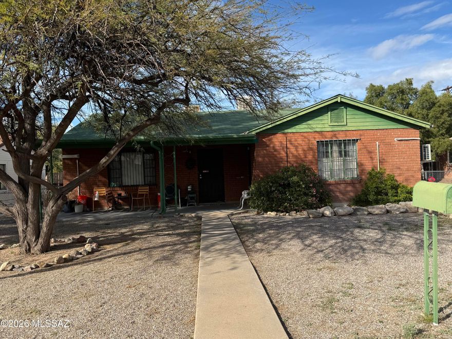 Wonderful duplex 3 blocks west of Reid Park, which is Tucson's version of NYC's Central Park! It features a zoo, golf course, band shell, tennis courts, lake, senior center, running and walking trails +++. This brick duplex has 2 -BIG 1 bedroom units, with RENTS WAY BELOW market! Each unit has 1bedrooms 1 bath living room/dining area and kitchen. All floors are ceramic tile. Heating is a mini-split in one unit and a mini-split and a window unit in the other. Each unit has an in-unit washer/dryer and security window bars. Monthly rents currently are $875.00 and $750.00. Tenants pay gas and electric. Leases expire 10-6-26. In addition, each unit has a private fenced yard with a mesquite tree. The charming covered front porch is shared by both units and is
quintessential Tucson. nicely manicured homes up and down this street.