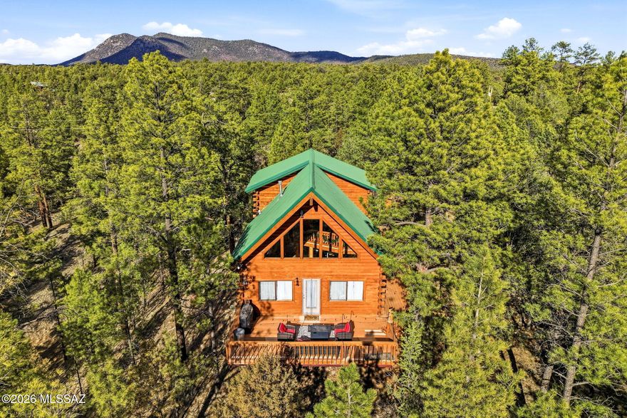 QUEMADO LAKE, NM - 3 BEDROOM & 2 BATH (PLUS LOFT) CUSTOM BUILT LOG CABIN ON 3.5 WOODED ACRES AT JUST UNDER 8000' ELEVATION. PROPERTY LOOKS OVER A SMALL ARROYO & IS FULL OF PONDEROSA PINES, JUNIPER & PINION. LARGE WRAP AROUND SOUTH FACING ''TREX'' DECK FOR MAINTENANCE FREE RELAXATION. ELK FREQUENT THE AREA DAILY. PRIVATE LOCATION WITH LIMITED VIEWS OF OTHER CABINS. 16X 24 DETACHED GARAGE & A STORAGE SHED. PLENTY OF LEVEL ROOM FOR AN ADDITIONAL WORKSHOP OR HORSE BARN. QUEMADO LAKE ESTATES IS A HOA COMMUNITY ($400 ANNUALLY - 2 LOTS) GATED ENTRY, MAINTAINED ROADS, VOLUNTEER FIRE DEPT & NO CHARGE TRASH TRANSFER STATION. THE SUBDIVISION RESTS ON THE SOUTH SIDE OF 9854' ESCONDIDO MOUNTAIN AND IS SURROUNDED BY THE GILA & APACHE NATIONAL FOREST. 1 HOUR TO SPRINGERVILLE, AZ & 5 HOURS TO TUCSON, AZ.