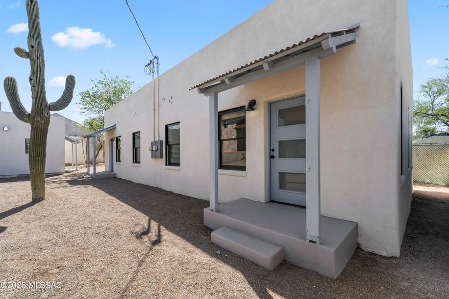 Charming 1BR/1BA duplex located in the historic West University neighborhood, just minutes from Downtown Tucson, University of Arizona and Pima Comm College. This is 1 of 2 units that will be available. Territorial Style home was fully remodeled 1 year ago and blends modern amenities with timeless historic charm. Cozy Living Room is bright and inviting, home is enhanced by neutral finishes, ceiling fans, overhead lighting, and an almost new HVAC system. Updated kitchen features SS appliances, generous cabinetry, great counter space, while the bathroom offers a beautifully tiled walk in shower. Enjoy the front entry awnings, private fenced backyard ideal for relaxing, and convenient off street parking. Separate laundry room building includes your own Washer, Dryer, & Storage Area.