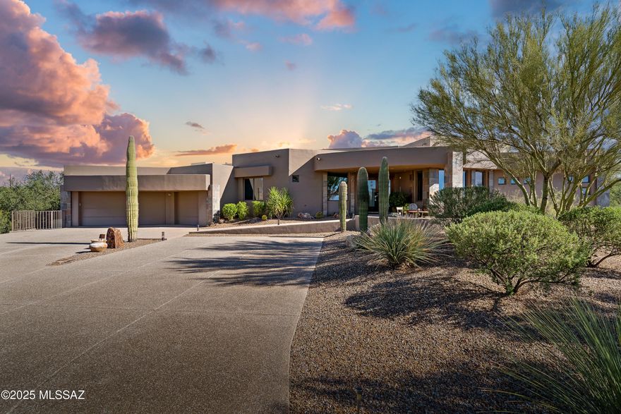 Come enjoy the location, exclusivity and privacy of this very special Oro Valley home. Custom built, this home features 4 bedrooms, 5 bathrooms, an office with built in desks/cabinets, game room, fitness area and a separate 1 bedroom, 1 bath guesthouse with a living area and kitchenette. Oversized 3 car garage with large laundry room. Sweeping mountain views from nearly every window on this elevated 4.67 acre lot. Enjoy spectacular views from your private backyard oasis with pool, spa, built-in BBQ and a separate viewing deck that captures the magnificent mountain and city views. A gourmet kitchen with double ovens, 2 dishwashers and a step-in pantry completes the entertaining possibilities. Designed in every way for both privacy and entertaining, this Oro Valley home stands out!