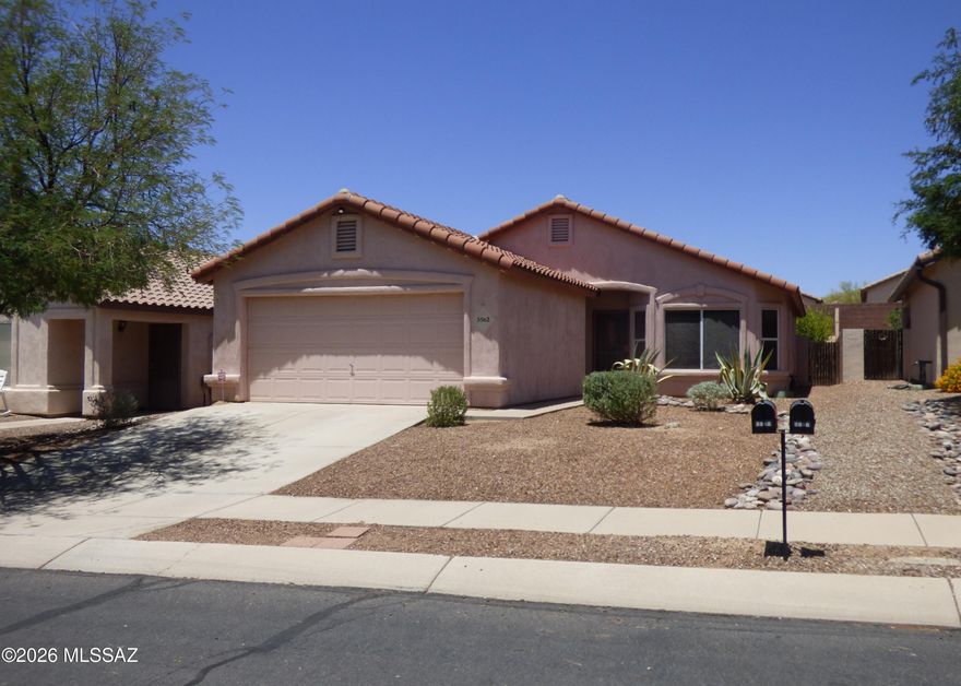 This warm and welcoming Dove Mountain home has so much to offer. The bright kitchen has a gas range, breakfast bar and plenty of counter space. Home also features sunscreens, ceiling fans and neutral colors. Large master bath has garden tub and separate shower. Inviting, easy care backyard with covered patio and citrus trees. Move in ready and lovingly cared for. Affordable, comfortable, and convenient. A great place to call home!