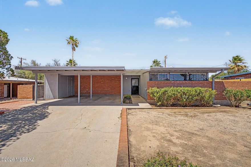 Fall in love with this charming single-story home! This gem boasts a great curb appeal, w/ a mature landscape and convenient carport parking. The interior showcases sizable living spaces designed w/ comfort in mind, featuring upgraded carpet, tile in select areas, & a soothing palette that makes every space feel warm and welcoming. Prepare feasts and quick meals in the bright galley kitchen, complete w/ oak cabinets adorned w/ crown molding, spacious counters, & essential appliances. The primary bedroom is a true retreat, including a private bathroom for extra comfort & easy outdoor access for convenience. Out back, your oasis awaits, w/ ample seating space, well-laid pavers, a ramada, perfect for gatherings, & a sparkling pool to enjoy sunny days! You don't want to miss it! Agent/Owner