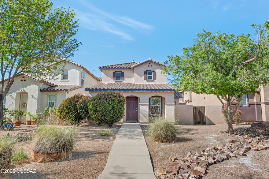 Welcome to this beautifully maintained 3-bedroom, 2.5-bath single-family home nestled in the highly desirable community of Rancho Sahuarita. Perfectly positioned in a prime location with convenient access to shopping, banking, highly rated schools, and quick freeway connections, this property offers both everyday convenience and the lifestyle amenities that make this community so sought after. From the moment you arrive, you'll appreciate the charm and thoughtful design. A private walkway leads you to the inviting front entry, while the rear-facing 2-car garage provides added curb appeal and functionality. The covered entry welcomes you into a light-filled living and dining space designed to feel both open and comfortable. Natural light pours in, creating a warm and inviting atmosphere that makes you feel at home the moment you step inside.
The breakfast bar seamlessly overlooks the efficient galley kitchen, creating an ideal flow for both daily living and entertaining. Whether preparing meals or hosting guests, the layout allows you to stay connected with family and friends. Direct access to the garage enhances convenience, especially for unloading groceries or coming and going with ease. A well-appointed powder room completes the thoughtfully designed main level. Upstairs, you'll find two comfortable secondary bedrooms perfect for guests, a home office, or growing households. The full hall bathroom includes a practical tub/shower combination, while the dedicated laundry room adds everyday convenience right where you need it most. The spacious primary suite serves as a private retreat, featuring dual vanity sinks and an oversized tub/shower designed for both comfort and functionality. It's a peaceful space to unwind at the end of the day. Beyond the home itself, Rancho Sahuarita offers an exceptional lifestyle with community amenities that include scenic walking paths, parks, a lake, pools, and recreational facilities--creating a true sense of neighborhood and community. Whether you're looking for your first home, a seasonal residence, or a low-maintenance property in a thriving area, this home checks all the boxes. Immaculately cared for and move-in ready, this property presents a wonderful opportunity to own in one of Southern Arizona's most vibrant communities. Schedule your private showing today and experience firsthand the comfort, convenience, and charm this home has to offer.