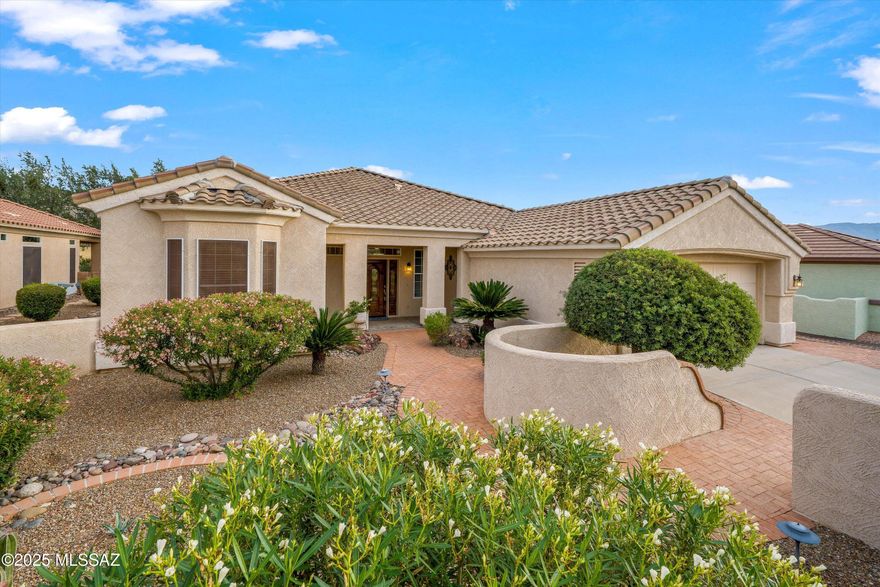 Welcome to this well-maintained Santa Rosa model in the Highlands at Dove Mtn! Views of the 16th fairway and Tortolita mountains. Perched on an elevated lot on 16th green, this 2BR/2BA/den home has an extended garage allowing space for golf cart/workshop or storage.  Spacious great room with living/dining areas perfect for entertaining.  Step out to the expansive patio with built-in BBQ, citrus trees, desert landscaping, and lush golf course greenery.  Fresh 2025 updates include new roof, SS appliances, kitchen hardware, dining room light, and extended paver walkway.  Builder upgrades include cherry cabinets (staggered heights with crown molding), large pantry, 3 bay windows, extended laundry room complete with cherry cabinets for storage and a storage closet. 
See More for additional Enjoy the large homesites extended driveway, front yard, and courtyard for seclusion.
Lots of additional features - Features & Benefits Listing in documents.
Ideal for golfers and entertainers-schedule your tour