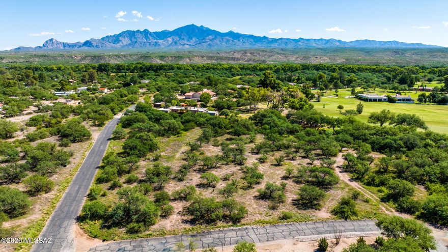 Discover an exceptional 1.01-acre parcel in Tubac Valley Country Club Estates. Nestled on the Tubac golf course, this vacant land has stunning mountain views of the Santa Ritas. With a capped well, natural gas, and electric to the lot line it's a canvas for your dream home. Experience desert charm, Tubac's art scene, and tranquil living.