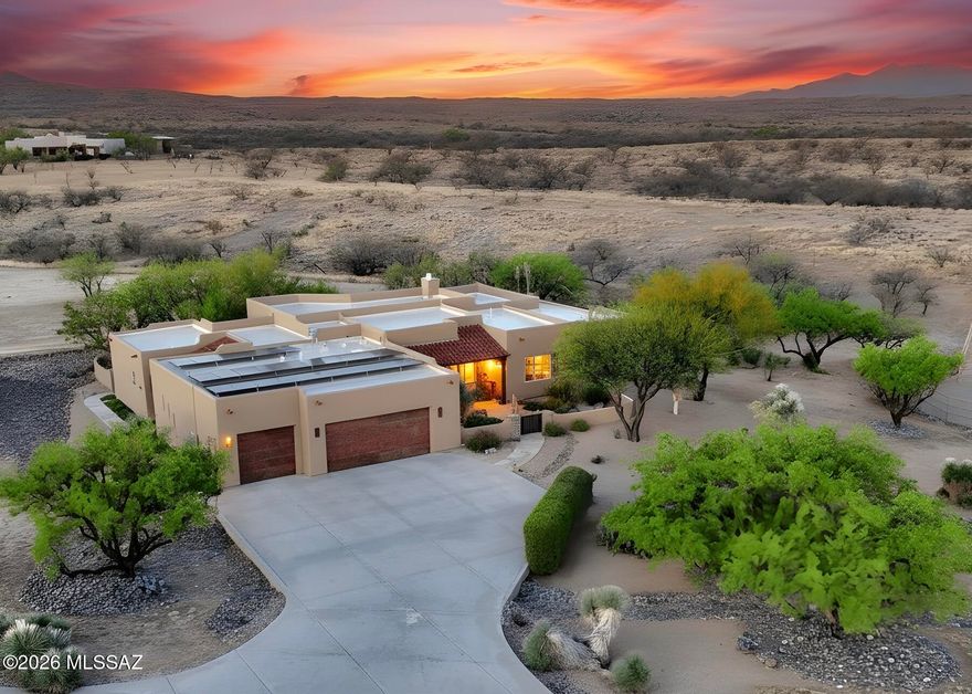 Back on the market at no fault of the home or the sellers!

Your Dream Home in Red Hawk at JSix Ranch Awaits! Nestled at the end of a quiet cul-de-sac, this custom-built Southwest Contemporary retreat offers elegance, comfort, and exceptional space for both everyday living and entertaining.
Inside, you'll find 3 bedrooms, 3 1/4 bathrooms, plus a private guest casita (1 bed/1 bath)--perfect for visiting family or friends. High-end finishes shine throughout, including travertine flooring, granite countertops, alder cabinetry, and premium KitchenAid stainless steel appliances.
The oversized primary suite is a true retreat, featuring a cozy sitting area, direct patio access, a spacious walk-in closet, and a spa-like bath complete with a luxurious walk-in shower and deep jetted tub. Expansive rear-facing windows fill the home with natural light while framing serene desert views.
Practical features include a three-car oversized garage--large enough for a full-size truck--and owned solar panels that significantly reduce energy costs.
Step outside to enjoy covered patios in both the front and back, ideal for soaking in stunning sunrises, sunsets, and the daily visits from local wildlife.
For equestrian enthusiasts, the property is fully equipped with a thoughtfully designed barn featuring two stalls with automatic waterers, a wash rack, storage space, and a temperature-controlled tack room with hot water. Additional amenities include paddocks, a round pen, a large turnout area, and a pipe-fenced arena--everything needed for your horses.
Both the interior and exterior have been freshly painted within the past two years, making this home truly move-in ready.