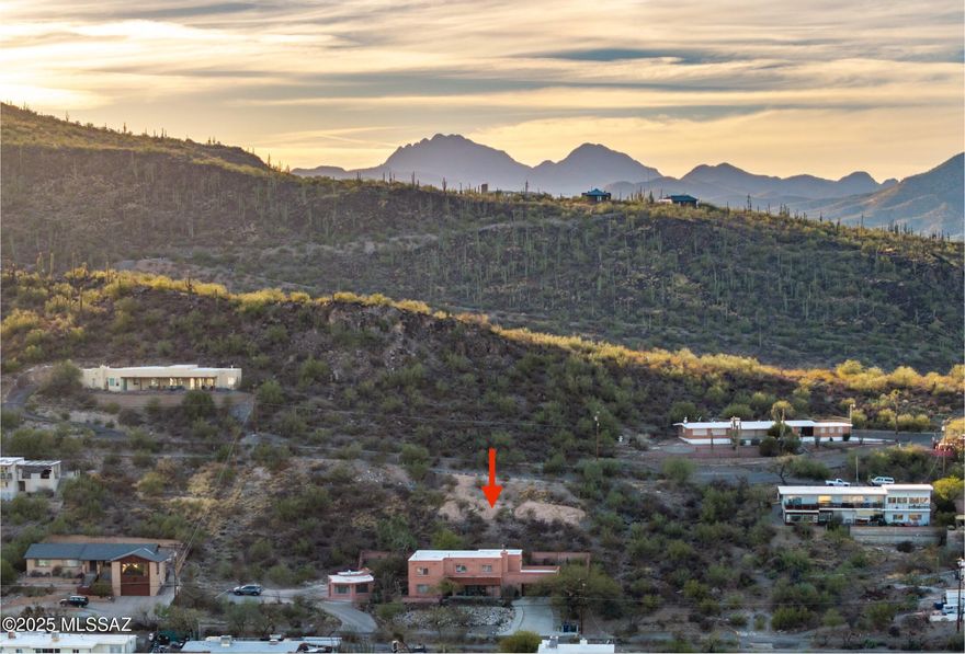 Come build your dream home on this hillside lot with an unobstructed view to downtown Tucson backdropped by the Catalina and Rincon Mountains. Hiking trails to A Mountain and Tumamoc Hill are just a stone's throw away. Enjoy the peace and tranquility along with being in close proximity to shops and restaurants in the city. Owner/Agent