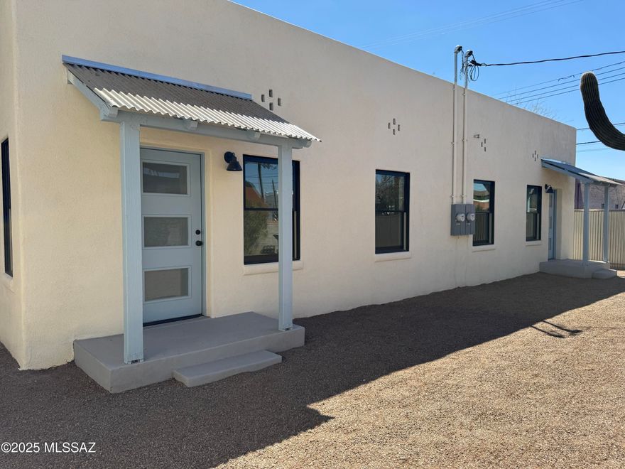 Charming 1BR/1BA duplex located in the historic West University neighborhood, just minutes from Downtown Tucson, the University of Arizona, and Pima Comm College. This territorial-style home was fully remodeled 1 year ago, blending modern amenities with timeless historic charm. Cozy Living Room is bright and inviting, enhanced by neutral finishes, ceiling fans, overhead lighting, and a newer HVAC system (only 1 year old). Updated kitchen features stainless steel appliances, generous cabinetry, and great counter space, while the bathroom offers a beautifully tiled walk-in shower. Enjoy the front and rear entry awnings, a private fenced backyard ideal for relaxing, and convenient off-street parking. Separate laundry room building includes your own washer, dryer & storage area.