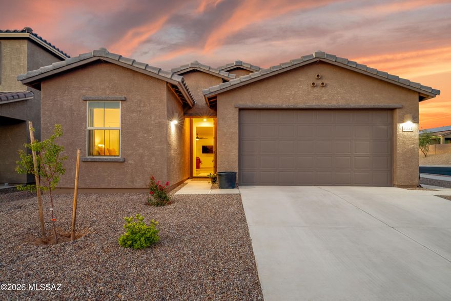 Welcome home! Move-in ready and offered fully furnished, this recently built home near Oro Valley features 2,278 sq. ft. of versatile living space, including a 2bed/2bath main residence and an attached 1bed/1bath NextGen casita with a separate living area. The bright, open floor plan showcases 9-foot ceilings, updated appliances, and spacious living areas throughout. Situated on a desirable corner lot, the property also includes a fully landscaped backyard, EV charger in the garage, and low-maintenance outdoor living spaces. Ideal for guests, extended household needs, or added flexibility, this home offers comfort, convenience, and modern amenities.