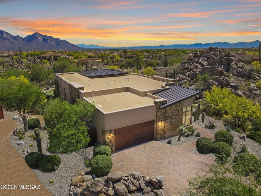 Welcome to an exceptional residence in the prestigious Stone Canyon community--where refined luxury meets breathtaking natural beauty. Better than new, this meticulously designed home showcases high-end finishes, designer fixtures, and thoughtful details woven seamlessly throughout every space.

Wake each morning to sweeping panoramic views from the expansive primary suite, complete with a spa-inspired bath and an oversized custom walk-in closet. Each guest bedroom offers its own private ensuite, providing comfort and privacy for family and visitors alike. A versatile bonus room creates the perfect enclave for a home office, media space, or retreat.

Natural light pours into the open-concept great room, highlighting the home's sophisticated design and effortless flow. Step outside to your covered patio, where power rolling shutters transform the space into a true three-season retreat--ideal for relaxing by the gas fireplace or entertaining year-round.

Take in the stunning surroundings while enjoying the resort-style saltwater pool, perfectly positioned to capture the home's incredible views. This is more than a home--it's a private sanctuary designed for elevated living.

A must-see to truly appreciate the scale, craftsmanship, and unforgettable vistas.