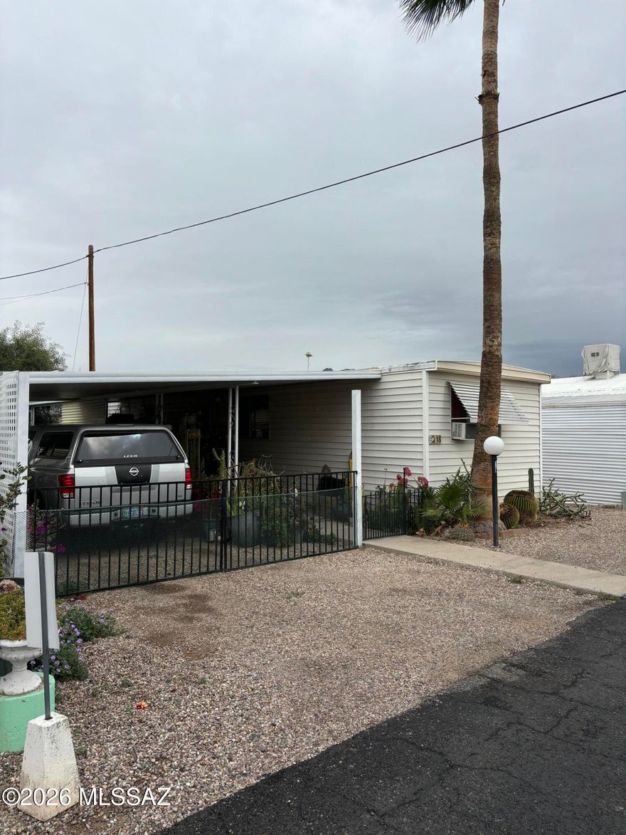 Inexpensive lot rent in Parkway Vista MHP. Only $513! Big yard with huge deck and carport! No rear neighbors! You have a storage shed! New Oven, new flooring installed! Mountain views. Amenities include clubhouse to enjoy and use for family gatherings, special events, pool table, and onsite laundry. Great Location, close to restaurants, shopping etc. Right off Oracle 2 min drive to Tucson Mall. Move in ready!!