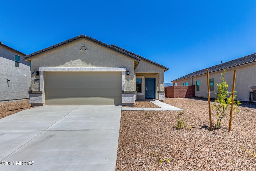 Home is under construction. Welcome to your ideal retreat in the heart of Tucson's newest community! This stunning single-story home offers 1331 sq ft of luxurious living space, featuring a spacious open concept floor plan that's perfect for modern living. With 3 beds and 2 baths, this home provides ample space for relaxation and entertaining. Enjoy the tranquility of a common area behind and a corner lot. Plus, rest assured knowing this home is ENERGY STAR Certified with a tankless water heater, ensuring energy efficiency and endless hot water. The inc smart home pkg adds convenience and connectivity to your daily life. With close access to I-10, the airport, and downtown Tucson, this home offers the perfect blend of comfort and convenience.