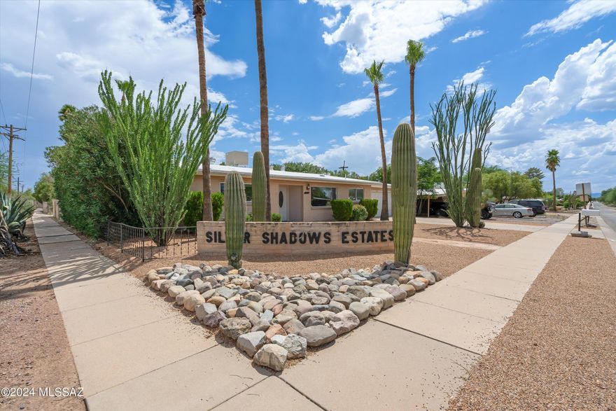 *Seller Financing Available* Modern luxury meets mid-century charm in this beautifully updated Eastside gem, located in Tucson's desirable Northeast Pio Decimo neighborhood. Situated on a generous corner lot, this remodeled 3-bedroom, 2-bathroom home offers 1,916 square feet of thoughtfully designed living space in a solid 1969 block home.
The updated gourmet kitchen is a showstopper, featuring a large center island, granite countertops, stainless steel appliances, and modern finishes that are perfect for entertaining or everyday living. Recently remodeled bathrooms, including a stunning primary bath, pair seamlessly with updated flooring, windows, and numerous upgrades throughout, creating a fresh, move-in-ready feel. A cozy gas fireplace anchors the dining area, adding warmth and character to the heart of the home. Natural light floods the space, while expansive windows frame the inviting large corner lot backyard with low-maintenance landscaping, a covered patio, and space to relax or entertain. Car enthusiasts, hobbyists, and adventurers will love the 4-car garages, including a workshop, offering endless possibilities for bikes, cars, tools, or an RV. No HOA means freedom to truly enjoy your space. Ideally located within walking distance to Udall Park, dining, shopping, and outdoor recreation, this home combines modern upgrades, flexible space, and an unbeatable Eastside location. Updated, upgraded, and lovingly maintained, this home is must-see. VA assumable loan at 3.5%, Old Republic Home Warranty and Seller Carryback Financing is available. You can't beat this deal or interest rate. Come see it for yourself!
