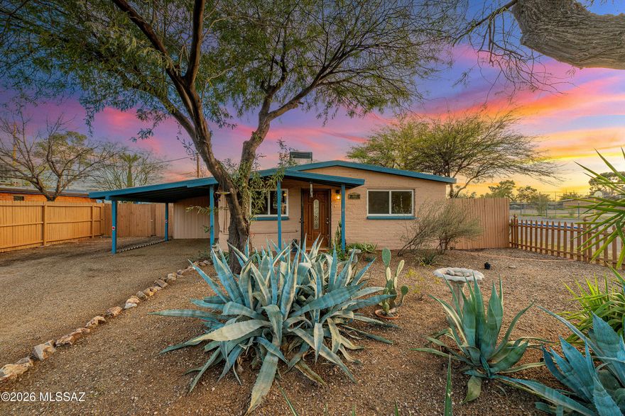 Don't miss this charming bungalow situated on a spacious corner lot in a centrally located, well-established midtown neighborhood. This 2-bedroom, 1-bath home offers 980 square feet of inviting living space with an open floor plan and multiple living areas.
You'll love the high wood-beamed ceilings, tile flooring throughout, and classic burnt adobe construction that add warmth and character. The large backyard features covered patios and storage sheds, providing plenty of space for outdoor enjoyment and extra storage.
Conveniently located across from John B. Wright Elementary School and just minutes from shopping, schools, TMC, The Loop, and other local amenities. With numerous updates throughout, this move-in-ready home beautifully blends modern comfort with historic charm.