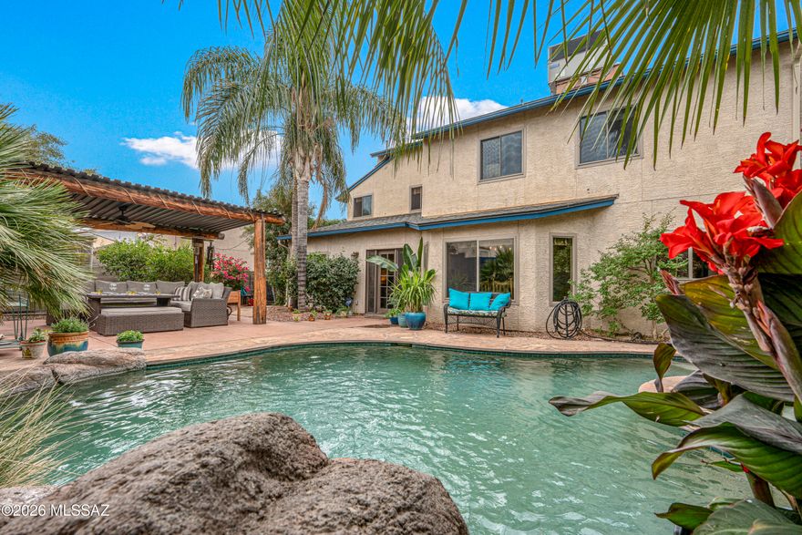 This beautifully updated 4 bedroom, 3.5 bathroom home offers the perfect blend of comfort, style and modern living.  Step inside and be greeted with soaring vaulted ceilings and an abundance of natural light. Enjoy your own private retreat    featuring a sparkling pool, relaxing spa and large ramada. A first floor guest quarters suite with separate entrance offers multigenerational living or rental options. For cooler evenings enjoy the cozy fireplace in the spacious family room. Fully updated kitchen with granite countertops and modern cabinetry. New roof (2025), new HVAC (2022), new windows (2024),owned solar system (2024), new pool equipment (2020), new dishwasher and range (2024) new upstairs carpeting (2023).