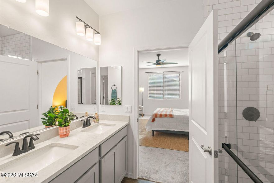 $10,000 Seller Concessions with acceptable offer! Welcome to effortless desert living in the heart of Tucson, Arizona! ✨ This 2021-built beauty blends modern style, thoughtful design, and everyday convenience just minutes from Davis-Monthan Air Force Base, Tucson International Airport, shopping and dining at Park Place Mall, and easy access to I-10.
Step inside to an open-concept floorplan that flows beautifully, offering 3 bedrooms, 2 baths, plus a dedicated multi-media room complete with projector and screen that convey. Artistic paint and design touches add personality throughout, while sleek quartz countertops in the kitchen and all bathrooms elevate the finishes. The primary suite features a stunning tiled shower, and wood-like plank tile runs throughout the main living areas for both style and durability. Enjoy peace of mind with major components only five years old, a soft water system already in place, and low-care front and backyard landscaping. The private backyard retreat includes a hot tub--perfect for relaxing under the Arizona sky. <5