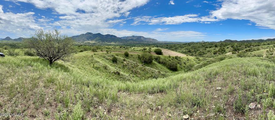 Great Views of Red Mountain, Santa Ritas Mountains and Patagonia below. The property is perfect for off grid living, rolling terrain for privacy, no HOA, attractive CC & R's, a good area for wells, electric is available at the lot line of parcel 2 or the entire 35+ acres. Lush vegetation, canyons and hilltops. Fence is not any property lines. Abundant wildlife close to National Forest. Close to Town of Patagonia yet private and rural.
