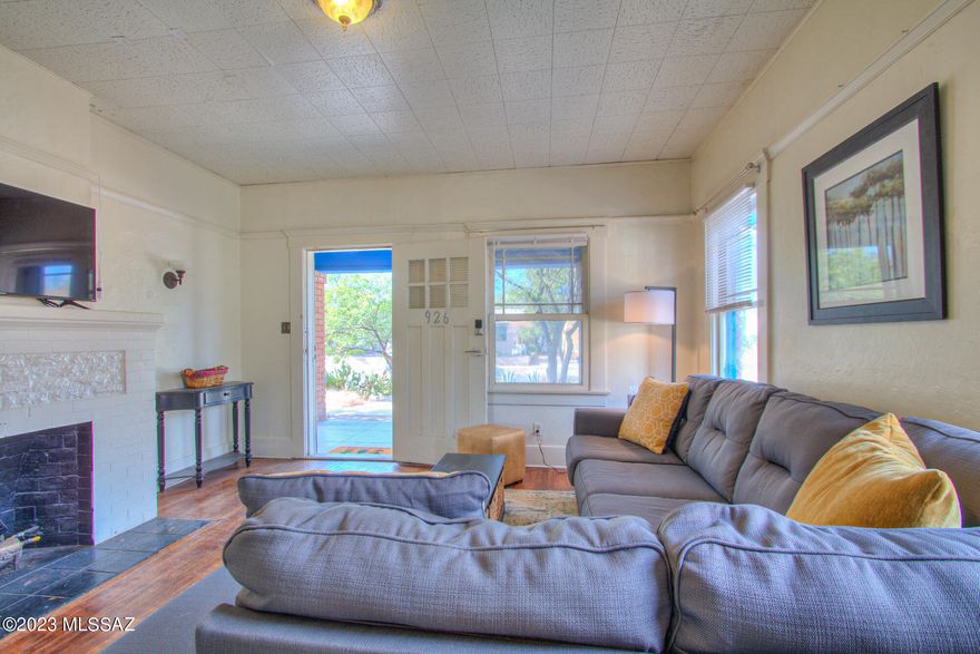 Available for short term (1 month) to long term (1 or 2 year) lease. Rare gem fully furnished townhome in the Historic University District. Walking distance to the University of Arizona, 4th Ave, Time Market and Downtown. This charming 1920's townhome has the original hardwood floors, two roomy bedrooms and a comfortable living space with a fireplace. Fully furnished! Off street parking 2 spots available. Water is included. Tenant pays electric & gas. Shared washer and dryer provided. Call or text David if you have any questions or if you would like to preview the home.