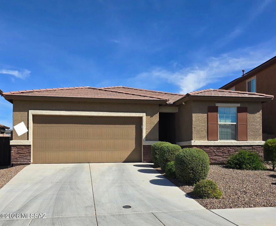 Beautiful updated home.   Kitchen offers granite countertops,  gas range, backsplash, island/breakfast bar, loads of storage, pull outs, huge pantry, deep undermount sink, neutral colors thru out, tile in all areas but bedroom 1 and master,  Large master with huge walk in closet and linen closet, Den has french glass doors, nice size laundry room, fully landscaped backyard, gas plumbed on side of home for bbq grill.  Huge sliding door that opens both ways for entrance to rear yard, nothing behind.  Community pools, splash pad, pickle ball, parks and walking trails, Close to I10 for easy access, Pride of ownership here!