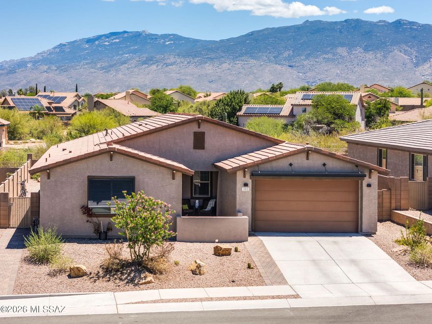 Better-than-new, 2024 Meritage home in gated Houghton
Reserve offers inspiring views of mountain ranges, natural
desert and brilliant sunrise/sunset skies; and an expansive
(2588sqft) flexible split-bedroom floor plan.
Each of the 4 bedrooms has close proximity to its own full
bathroom (bedrooms 2 and 3 share a Jack-n-Jill bath) and all
bedrooms have their own walk-in closets.
The cooks-delight kitchen is open to over-sized windows
looking out into backyard, the dining area and the great room.
It offers a huge island with sit-up bar, granite countertops,
Energy Star-rated Kitchen-Aide stainless appliances (inc. a
''drawer dishwasher'' and double ovens).
The home is further complemented by wood-look vinyl
laminate flooring (NO CARPET!), ceiling fans in all bedrooms
and Great R can lighting throughout.
Additional features include a smart garage door, smart
thermostat, solar motion lights in the backyard and pre-wired
security. The 3-car garage includes two ceiling racks.
Outdoor living has been enhanced with the addition of an
enclosure in the front entry creating a lovely courtyard, added
pavers to extend the width of the driveway, a paver path from
the front of the property to side gate leading into the backyard,
expanded covered patio and low-maintenance landscaped
backyard. The community offers sidewalks and parks.