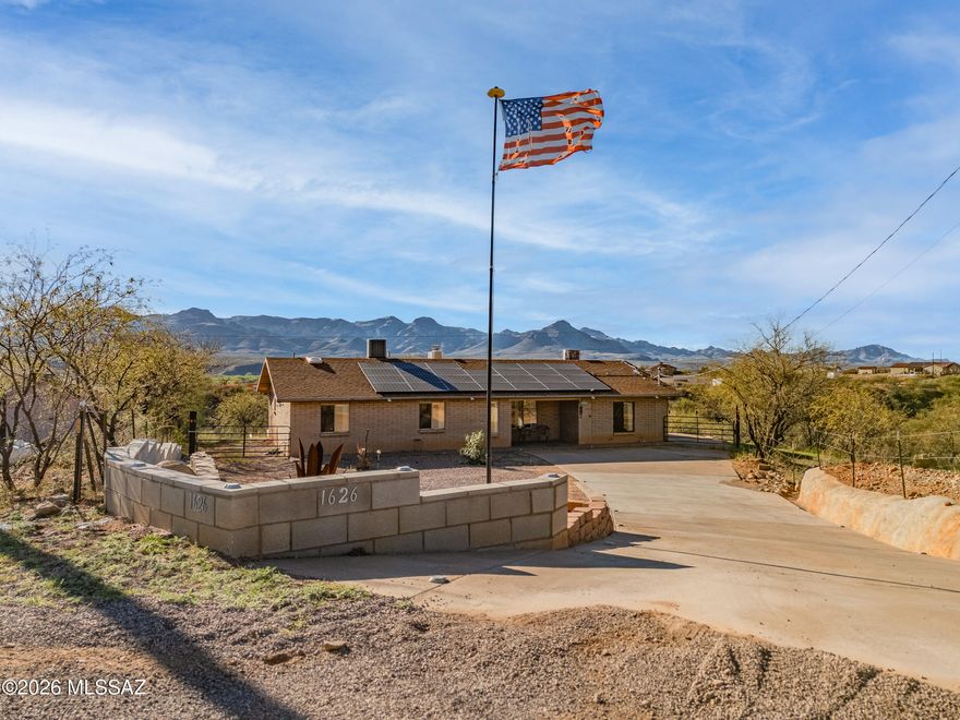 Surrounded by breathtaking mountain views, this inviting 3 bed, 2 bath home with a dedicated office and spacious Arizona room offers the perfect blend of comfort and scenery. Inside, you'll find a bright, open layout with versatile living spaces ideal for working from home or relaxing with family. The Arizona room provides the perfect spot to enjoy peaceful mornings, vibrant sunsets, and year-round indoor-outdoor living. Nestled in a serene setting with stunning natural beauty in every direction, this home delivers privacy, tranquility, and room to live the lifestyle you've been dreaming of.