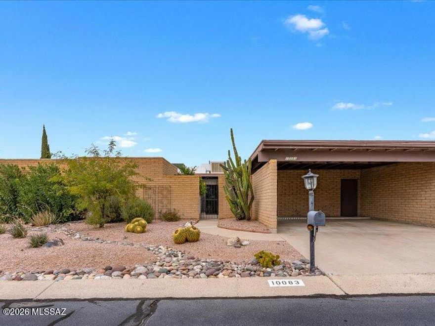 Charming townhouse in sought-after Oro Valley, set against stunning mountain views in the shadow of the Pusch Ridge Santa Catalina Mountainsâ”just minutes from the Oro Valley Country Club. This spacious 1,744 sq. ft. home is filled with abundant natural light throughout. Featuring 2 bedrooms and 2 bathrooms, the home has been freshly painted and includes new carpet in the primary bedroom. Enjoy a large living room, a convenient galley kitchen, and a family room that offers great additional living space. The elevated lot provides privacy, with back-neighbor views nicely shielded. Adjacent to the Oro Valley Golf Club community, two community pools, (one heated) within walking distance. This solidly built home is ideally located near shopping, dining, entertainment, golf courses, hiking trails, and bike paths.