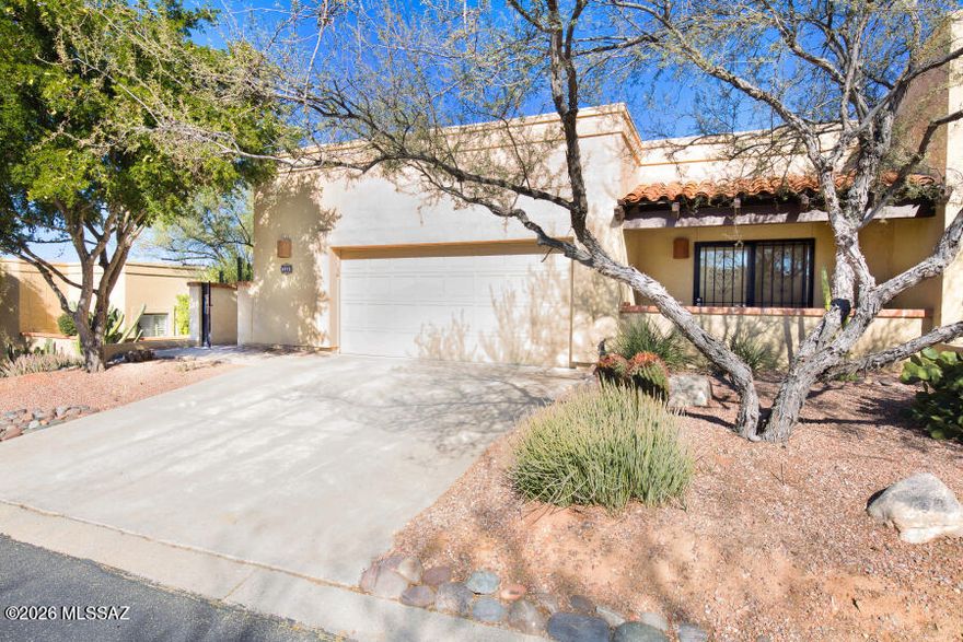 MOTIVATED SELLER PRICE ADJUSTMENT! Prestigious El Conquistador Patio Home adjacent to the Hilton El Conquistador Resort. Beautiful updated and freshly painted 2 bed 2.5 bath plus den/office, fabulous spacious kitchen has quartz counters, custom cabinets, newer stainless appliances, custom tile backsplash. High ceilings, large windows and doors overlook the covered patio view of the Pusch Ridge Golf Course 3rd fairway. Large master suite, walk-in closet with custom walk/roll in shower. Generous 2 car garage, storage cabinets and epoxy finish on the floor. You will love the convenience of all that Oro Valley has to offer, enjoy the breathtaking view of the mountains right from you own back patio.