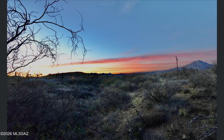 Welcome to 100 Calle Quintana, a rare opportunity to own raw land in the rolling hills of Rio Rico, where wide-open skies, mountain silhouettes, and quiet surroundings set the stage for something truly special.
This parcel offers the freedom that existing homes simply can't: the ability to design a custom residence tailored to your lifestyle, whether that's a modern desert retreat, a sprawling single-story ranch, or a private escape with room to breathe. With natural terrain and open space as your canvas, the possibilities here are limited only by your vision.
Located in a peaceful area yet still within convenient reach of town amenities, this property strikes the ideal balance between privacy and accessibility. Enjoy sunsets that stop you in your tracks, star-filled nights, .. and the sense of space that reminds you why you chose Southern Arizona in the first place.
Raw land means no outdated floor plans, no renovation headaches, and no settling--just opportunity. Bring your builder, your architect, and your imagination, and create something lasting in a community where space, views, and potential still exist.
If you've been waiting for the right piece of land to build your future, this is it.