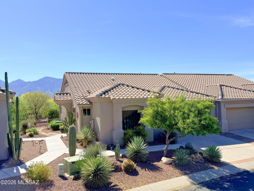 Introducing a stunning Chula Vista model located on a premium mountain view lot! This 2-bedroom, 2-bathroom plus den home spans 1,593 square feet and is situated in the gated, age-restricted community of Vistoso Village. The open floor plan features vaulted ceilings, tile flooring in all main living areas, and wood laminate flooring in the bedrooms, complemented by bay windows that add extra space and natural light.
The kitchen seamlessly opens to the great room. The kitchen is equipped with ample cabinetry, beautifully updated raised panel luxury cabinets with a glaze finish, granite tile countertops, and a sleek slate appliance package. The user-friendly layout includes a convenient breakfast bar.
The spacious primary suite offers spectacular mountain views, while the primary bath featuring a dual vanity with a granite countertop, custom finishes, a generously sized, updated tile walk-in shower, and a walk-in closet. The ensuite bedroom and bath ensure guests have both privacy and accessibility. The versatile flex room can serve multiple purposes, limited only by your imagination! The 2-car garage is equipped with a utility sink, storage cabinets, and a small work area for added convenience.  Enjoy breathtaking mountain views from the east-facing back patio, which features a green buffer for privacy. The extensive tumbled paver patio includes built-in seating for entertaining, an added sunshade, and professionally landscaped front and rear yards.  The HOA fee covers- water/sewer, trash/recycle pick-up, cable TV, in-home WiFi, front/backyard landscaping, exterior painting, monthly pest control to include termite, roof, structure insurance, gate for security, and clubhouse access, making more time for homeowners to enjoy everyday life! The clubhouse offers a wealth of amenities that are too numerous to list!