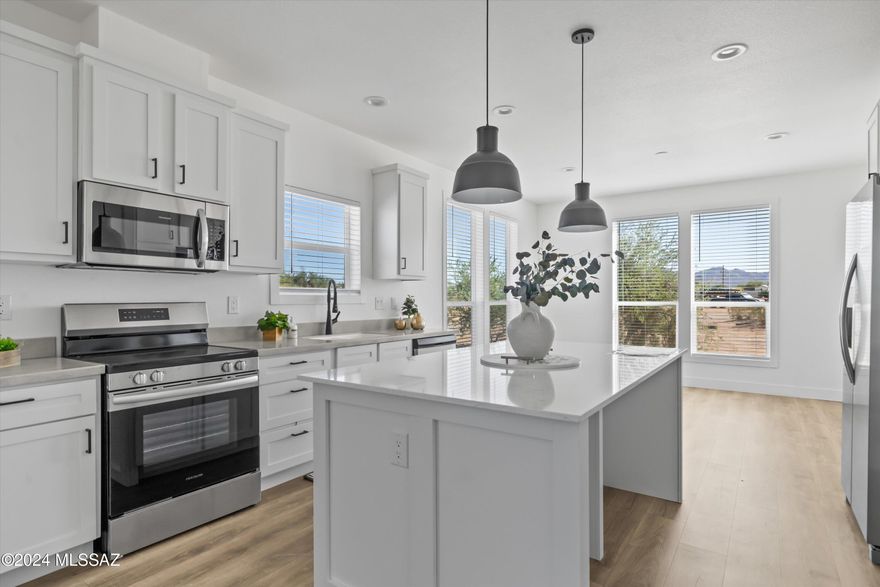Brand new home on a one acre parcel with an open floor plan,  modern cabinets, custom backsplash - New A/C with warranty. This kitchen has a very large walk in pantry, oversized island / breakfast bar with quartz counter top and SS appliances. A 3 bdrm 2 bath home that is Move in ready! Bring your toys or RV. No HOA! Enjoy the beautiful sunsets and mountain views in your new home. Home has a one year warranty with the builder.