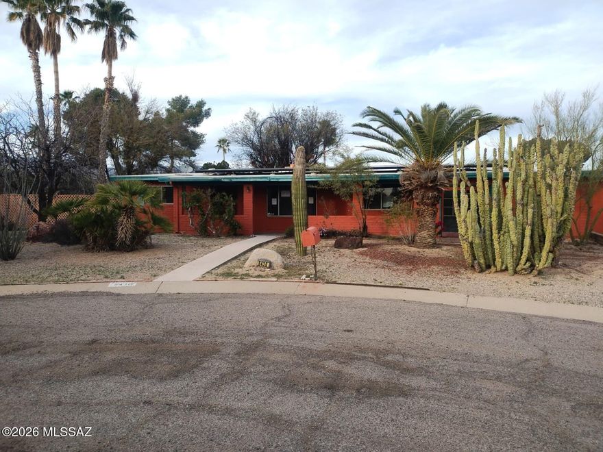 Enjoy the potential of this 3-bedroom, 2-bath home with a 2-car garage, cozy fireplace, abundant natural light, and a private in-ground pool perfect for relaxing or entertaining. The functional layout offers comfortable living spaces with opportunity to add personal touches. Conveniently located near Park Place Mall, Trail Dust Town, shopping and dining along Tanque Verde Rd, and outdoor recreation at Udall Park and nearby golf courses. Easy access to major roads, schools, and everyday amenities adds to the home's appeal. A great opportunity for buyers seeking desirable features, location, and long-term value.