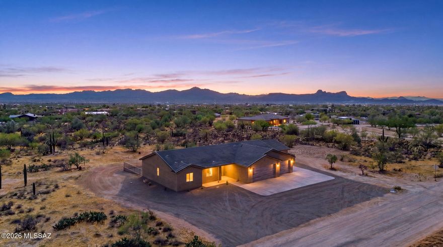 QUALITY, Brand New 4 Bed/ 3 Bath Plus DEN Masonry Construction on 4.154 Acres w/natural desert landscaping & sweeping mountain views! A 3-Car Garage + concrete driveway for extra parking welcomes you. Discover an open, airy layout featuring polished concrete flooring, vaulted ceilings, fire sprinklers, neutral paint, recessed lighting, & a fireplace anchoring the living area. Maple Cabinet Kitchen has SS appliances, abundant cabinetry, quartz counters, & breakfast bar. The main bedroom boasts sliding doors to the backyard, a walk-in closet, & a private bathroom w/dual sinks, a jetted tub, & a glass-enclosed shower. A dedicated laundry room with a sink & cabinets adds convenience! Out back, a covered patio for enjoying stunning mountain views. RV Electric at panel & Solar Ready!