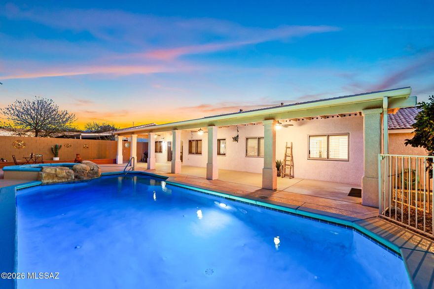 Range Priced-Seller will accept/or counter offers b/w $479,000 & $510,000. Enjoy comfort, space & extensive upgrades in this beautifully maintained, block stucco, split-bedroom home featuring a 3-car extended garage with built-in storage, toolbox & workbench. Two newer HVAC systems (both A/C units and furnaces under 3 years old) provide peace of mind and efficiency. Formal living and dining rooms create elegant gathering spaces, while the remodeled kitchen impresses with pull-out shelving, soft-close drawers, a large breakfast bar, and seamless flow into the family room & everyday dining area. The spacious primary suite offers a charming bay window, walk-in closet, and a bath with dual sinks, garden tub & separate shower. Both bathrooms feature double vanities and generous counter space. Indoor shutters and Bulldog security screens add style and function throughout. Step outside to a Southwest-inspired, low-maintenance backyard designed for year-round enjoyment. The expansive 57-foot covered patio with three ceiling fans overlooks a professionally maintained heated pool and spa, complemented by mature fruit trees. A separate workshop with electricity adds convenience for hobbyists & a separate side yard with a large gate for easy access. Visit today & Fall-In-Love!