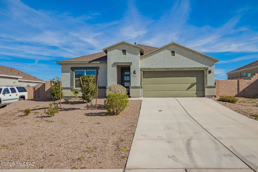 Charming & move-in-ready home! A low-care front yard & two-car garage provide great curb appeal. Enter to see wood-style tile floors, recessed lighting, thick baseboards, & neutral paint throughout the open layout. Cook delicious meals in the open kitchen featuring SS appliances, a walk-in pantry, a breakfast bar island & elegant quartz counters. Delightful primary bedroom serves as a relaxing retreat with a private bathroom that includes dual sinks for comfort. Discover a backyard comprising a covered patio, mountain views, & ample space for endless possibilities. This gem won't last long!  Buyer/Buyer's Agent to verify all facts, figures, schools, dimensions, Sq Ft, permits HOA Information etc. that is of material issue.