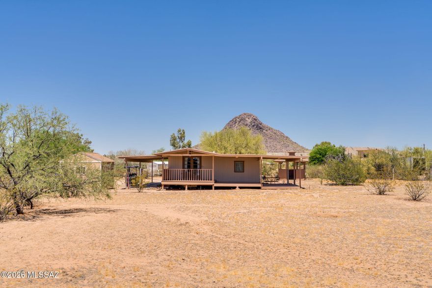 Peace, Quiet & Serenity await on this stunning G-1 Property on over an acre! This beautifully updated home features a brand-new kitchen, newly remodeled bathrooms, and a gorgeous wraparound covered patio perfect for enjoying breathtaking mountain sunrise and sunset views. Large Tuff Shed for all your additional treasures. 2 carports, 1 extended. 2 Mini splits & 1 A/C window unit. Relax and unwind in the walk-in jacuzzi tub in the 2nd bathroom, or create your own private outdoor retreat with the gazebo already waiting for your future spa or jacuzzi. With 2 carports and plenty of space to enjoy the outdoors, this property offers the perfect blend of comfort, privacy, & scenic beauty. Financing available.