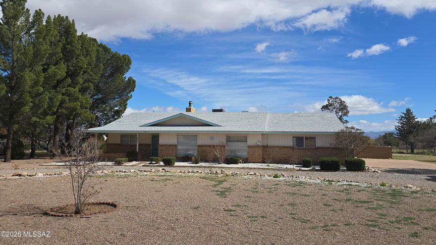 Seller offering $20,000 in concessions toward buyer updates, appliances, or closing costs--flexible terms to help make this home truly your own. Located in a quiet, established Sierra Vista neighborhood, this solid 1979-built home rests on a private 1.31-acre lot with sweeping, unobstructed mountain views that set it apart. The expansive outdoor space is the property's greatest asset, offering endless possibilities for gardens, an outdoor kitchen, workshops, RV parking, or peaceful gatherings--all framed by those stunning mountain vistas. It delivers rare privacy while remaining just minutes from Fort Huachuca, shopping, schools, and abundant outdoor recreation.
Inside, the well-built foundation includes updated essentials such as a brand-new roof, a modern HVAC system, and a refreshed kitchen. The interior is ready for your personal vision to bring it fully to life. Featuring five bedrooms and three bathrooms, the spacious 2,630-square-foot layout is ideal for a large family, multi-generational living, a home office, or guest accommodations. Don't miss this opportunity to create your ideal Arizona retreat at a motivated price.