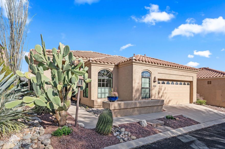 Step into the elegance of this tastefully remodeled 'Villa'' on a premium lot bordering lush desert common area. Located just across from the hole 9 tee box of the Canyon Course, it has one of a kind incredible unobstructed mountain views. Enjoy the sunrise over Sabino Canyon's Thimble Peak from the breakfast area, kitchen, living room, master suite and covered patio! Located in exclusive Ventana Canyon Golf and Racquet Club, this two bedroom, two bath, plus office/den has it all. Quality finishes and dÃ©cor abound, including custom wood and security doors, designer lighting fixtures, gorgeous cabinetry, gourmet kitchen with stainless appliances. 18' vaulted ceilings and high-fashion Minchella window coverings included throughout. Hardwood flooring in primary suite with limestone bathroo From the moment you enter you will feel the elegance and quality of the space all around you. New patio pavers, drip sprinkler system, automatic exterior in-ground lighting.  Epoxy flooring and built-in cabinets in the air conditioned garage. Furnishings may be available via separate bill of sale.