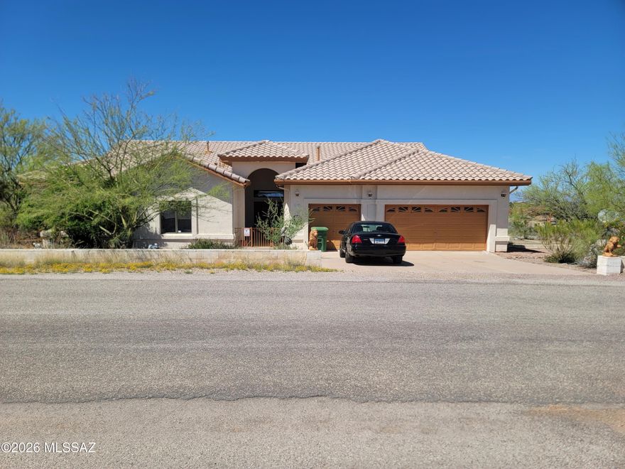 Stunning Tombstone home with pool and sweeping views, designed for effortless indoor-outdoor living. Beautiful tile flooring runs throughout much of the home, while four sets of French doors open to the patio, filling the space with natural light and creating the perfect setting for entertaining.

Enjoy unforgettable sunsets from your patio or living room, with a layout ideal for hosting and relaxing alike. A unique opportunity to own a home full of charm, views, and entertaining potential.