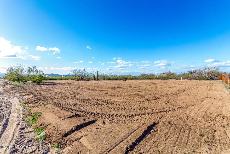 Huge 1+ acre lot right off of a paved road in beautiful Sahuarita! This lot has electric and water onsite. Clearing already started. Easy access. Ideal location for your future home or investment. No HOA. Plenty of room for your RV, animals, and homestead ideas. Horses and manufactured homes welcome! Large Saguaro onsite will be transported off lot and does not convey with property. Lot lines are approximate. Buyer to verify all.
Owner related to Listing Agent.