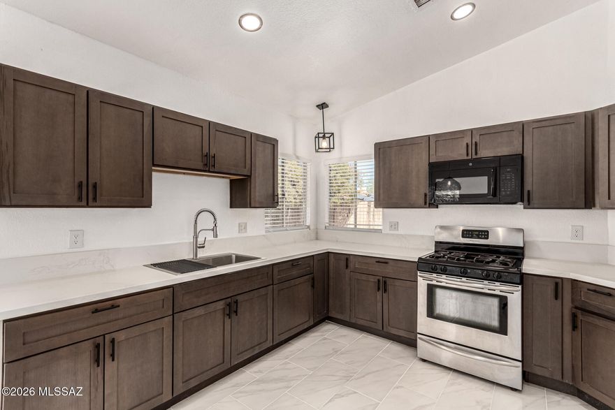 Welcome to Summer in the Presidio, where life feels bright, easy, and full of possibility ✨ 

Located on Tucson's southwest side, this incredible home is filled with natural light the moment you walk in. Enjoy an upgraded kitchen ready for everyday living and entertaining. Big-ticket upgrades are already done for you, FULLY PAID solar, newer AC, and updated piping, giving you peace of mind from day one. With a low HOA and a community pool just around the corner, it's perfect for summer living without the maintenance. 

Don't wait till summer to make this home yours.
