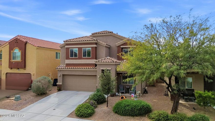 Located in Vail, just outside the Rancho Del Lago area, this 2017-built home offers 2,587 sq ft with 4 bedrooms and 2.5 bathrooms. All bedrooms are upstairs, along with a spacious loft ideal for a second living area. The main level features a kitchen with granite countertops and a large island, plus a separate downstairs den, perfect for a home office or flex space. Recent updates include new laminate flooring throughout both levels and new carpet on the stairs. The backyard is designed for Arizona living with a covered patio and swimming pool! Additional features include a two-car garage and convenient access to parks, schools, and major employment corridors. An assumable 3.125% VA loan may be available to qualified VA eligible buyers.