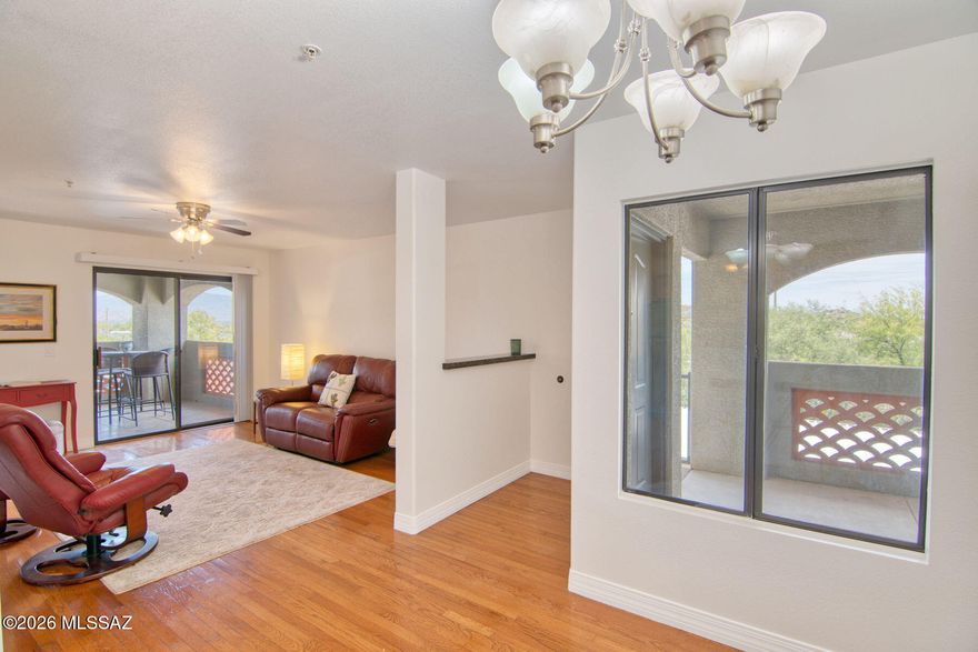 Range priced, Seller will entertain offers between $200,000 and $220,000. This is a must see unit. Corner and end unit with panoramic city and mountain views. Sit on you patio, relax and watch the city lights twinkle. Real hard wood floors, new paint, and in premium condition. This beautiful condo is perfect and move in ready. Great for winter visitor or vacation rental. One of the nicest units in Veranda! Don't  miss this one! Owner/Agent